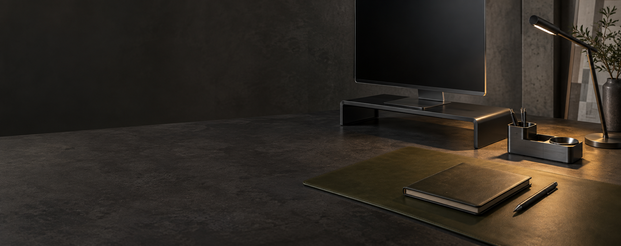 Precision desk setup with task light, organizer, riser and leather pad
