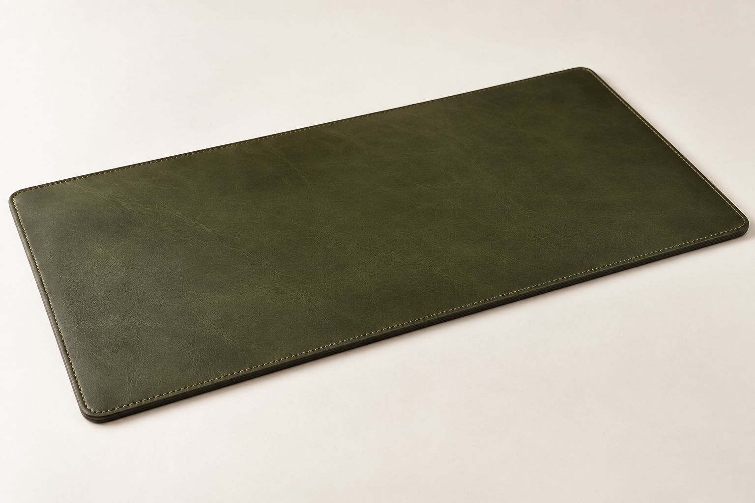 Monolith stitched leather desk pad